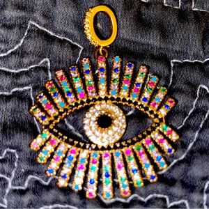 Sterling Silver Evil Eye Charm necklace not included. Multi colored rhinestones